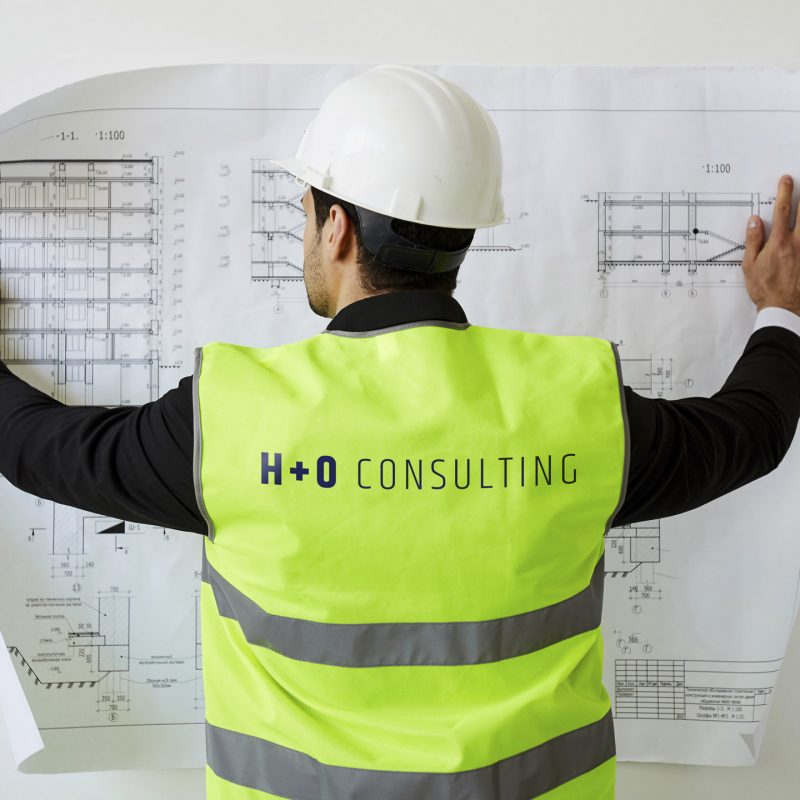 Crate47's corporate id for H+O showing branding on a hi-vis waistcoat